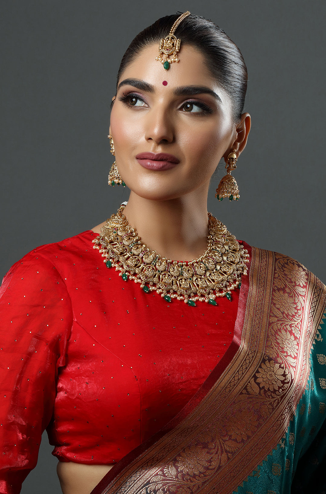 Gold Finish Necklace Set With Lakshmi Motifs