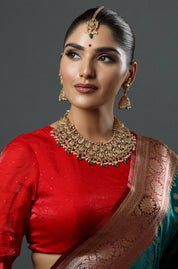 Gold Finish Necklace Set With Lakshmi Motifs
