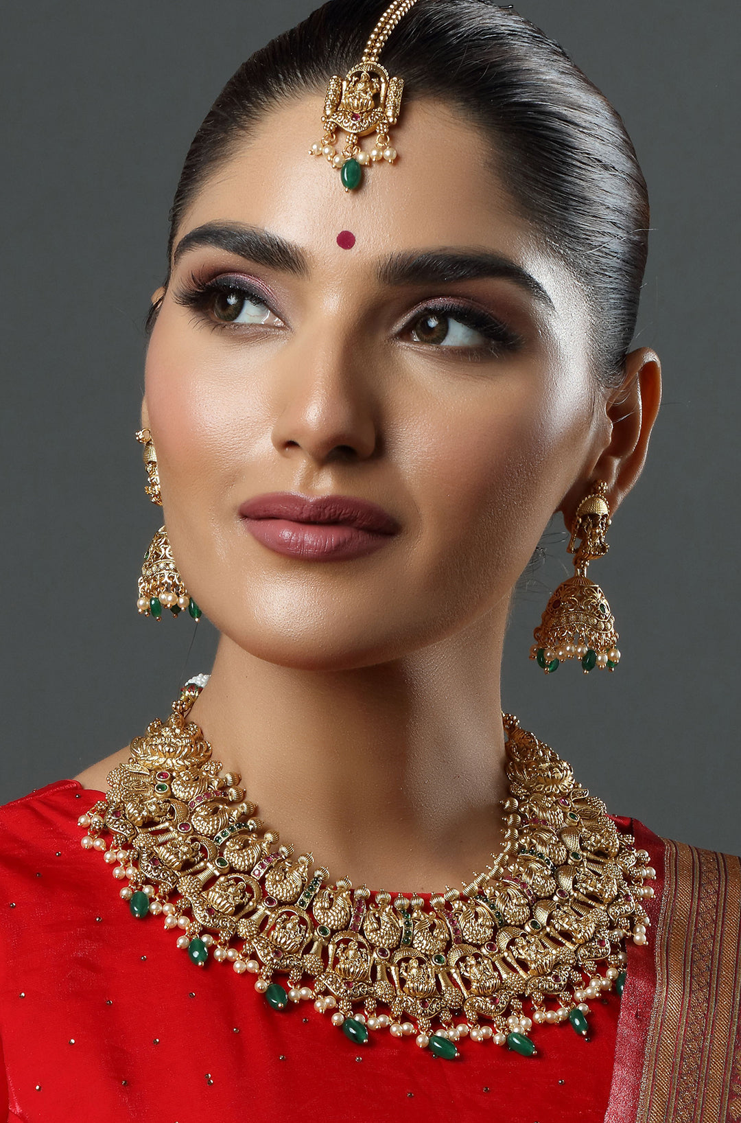 Gold Finish Necklace Set With Lakshmi Motifs