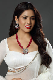 Majestic Pink Beaded Necklace with an Intricate Bird Pendant