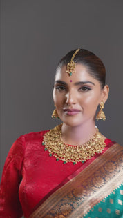 Gold Finish Necklace Set With Lakshmi Motifs