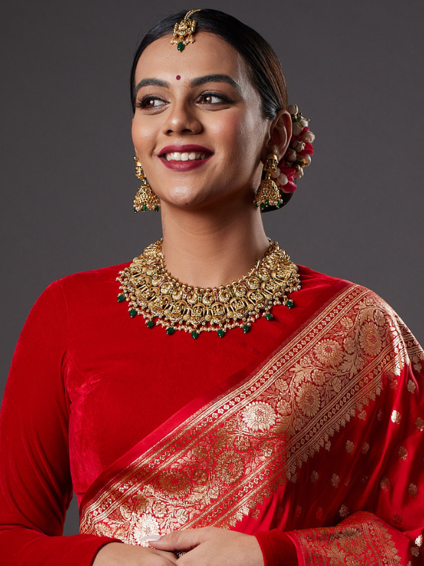 Gold Finish Necklace Set With Lakshmi Motifs