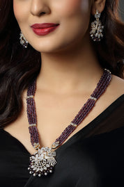 Majestic Purple Beaded Necklace with an Intricate Bird Pendant